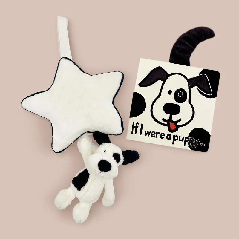 Fluffy and charming Jellycat itemsJellycat Bashful Black and Cream Puppy Musical Pull with If I Were A Puppy Board Book