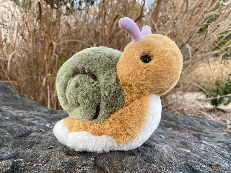 Cheerful and happy stuffed figuresShelby Snail