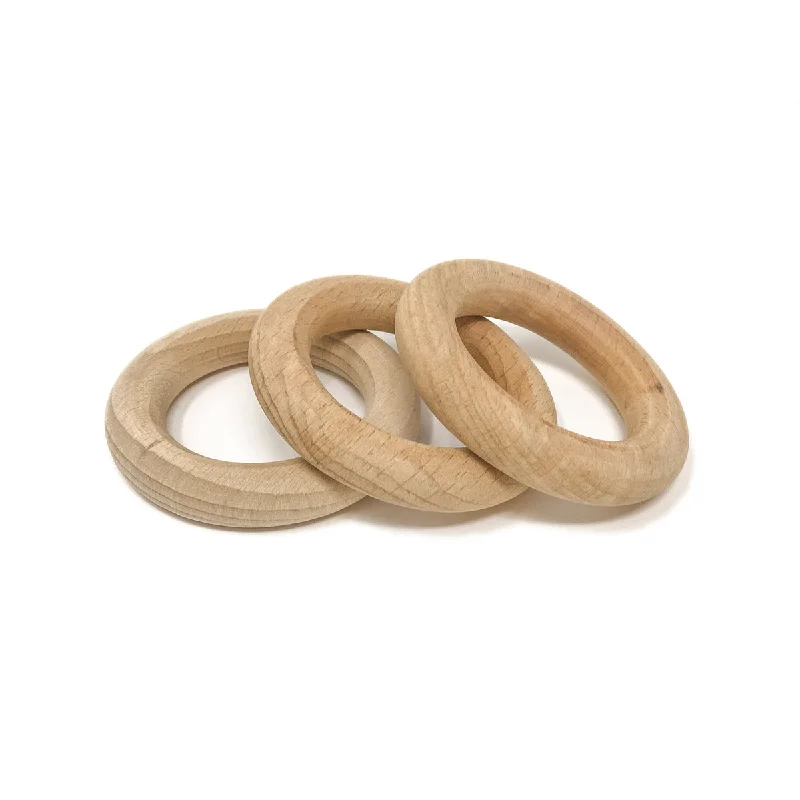 intricately designed wooden toys                 Grapat natural rings 3 pcs