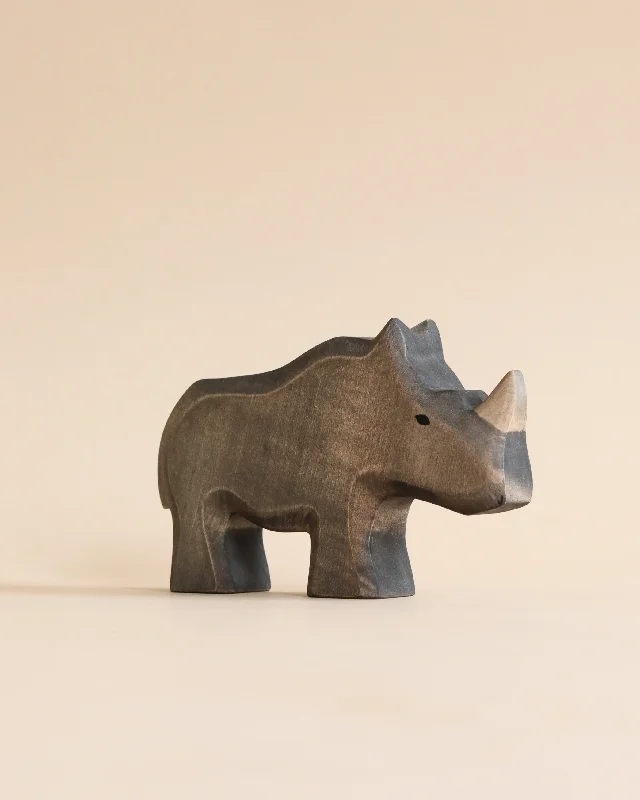 enchanting wooden toys that bring joy and happiness to children                   Handmade Holzwald Rhino