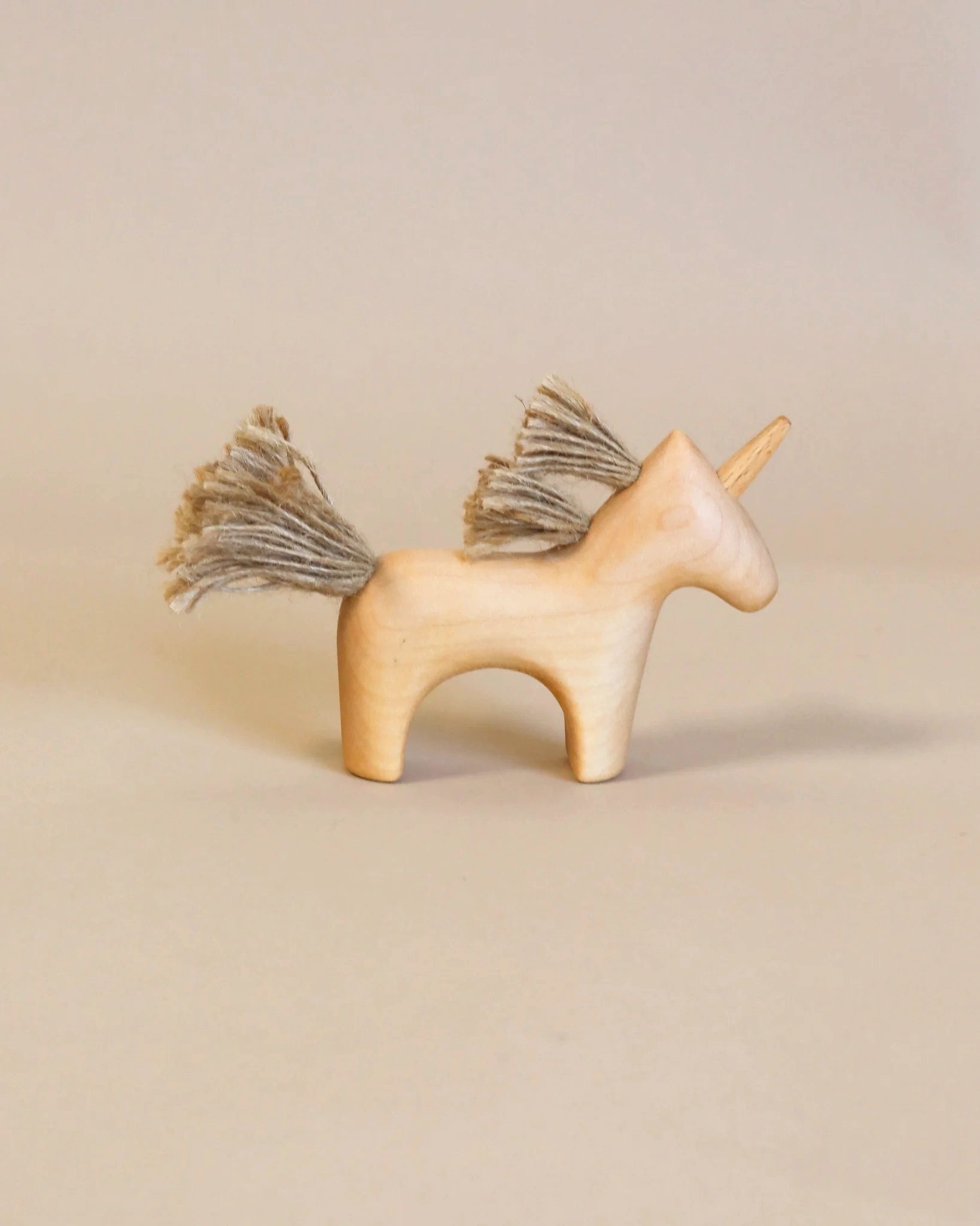 robust and child-safe wooden toys for all ages                   Handmade Wooden Unicorn