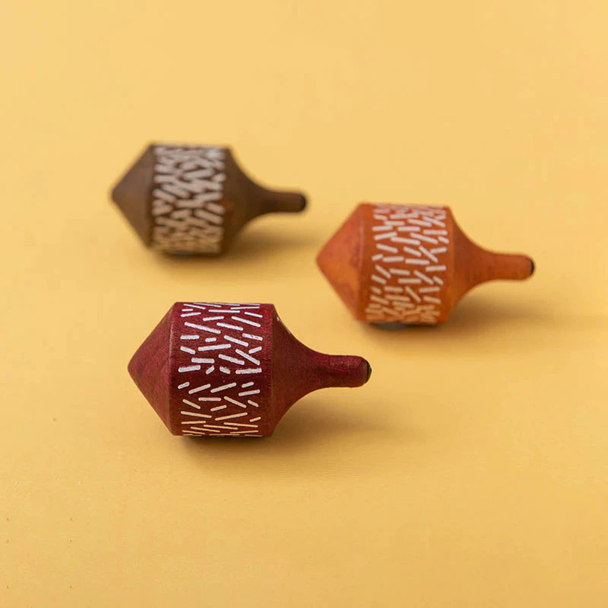 thoughtfully designed wooden toys              Londji spiky hedgehog spinning top