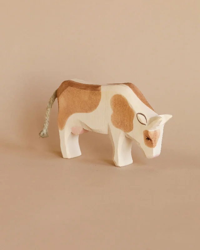 age-appropriate wooden toys                   Ostheimer Cow - Eating