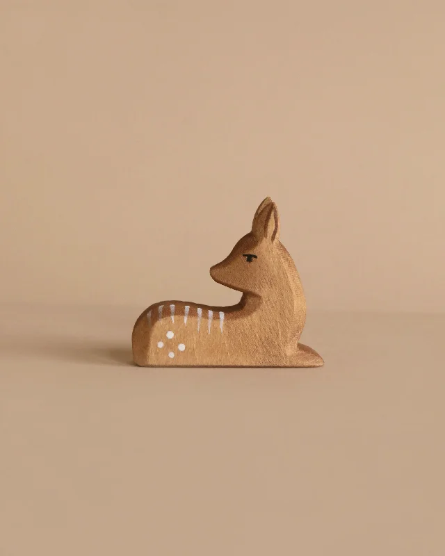 detailed wooden toys                 Ostheimer Fawn, Lying Down