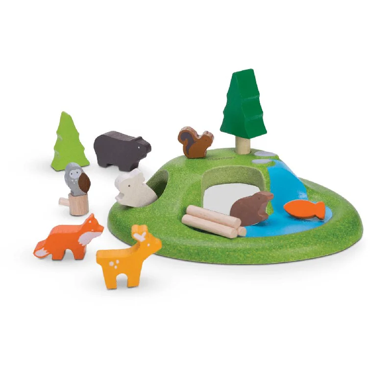 intricately carved wooden toys                   Plan Toys animal set