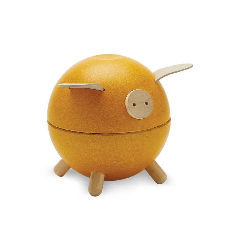 skillfully made wooden toys               Plan Toys piggy bank yellow