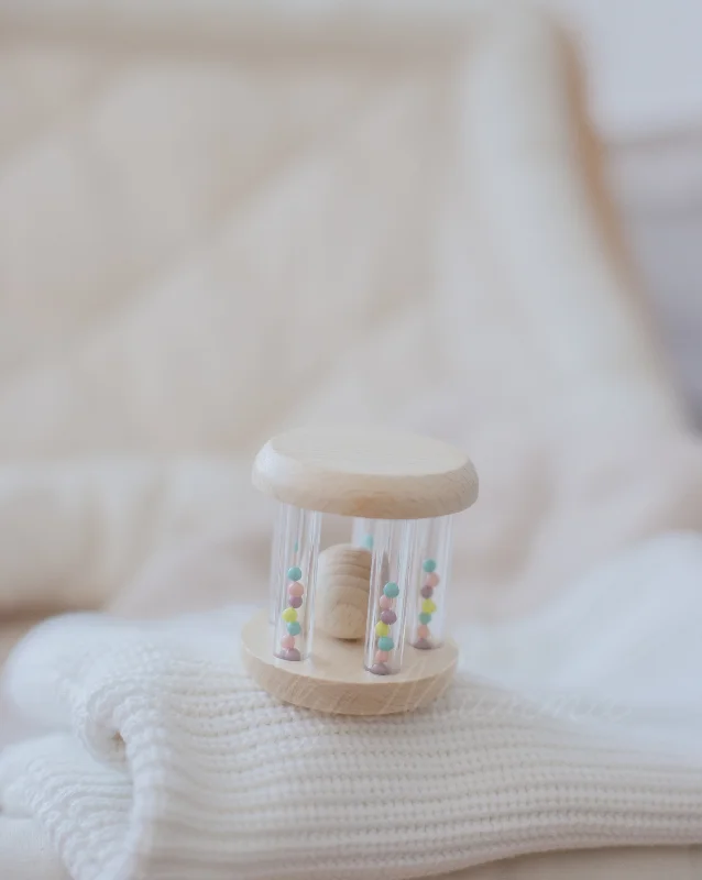 thoughtfully crafted and safe wooden toys                   Wooden Shaker Rattle With Rainbow Beads